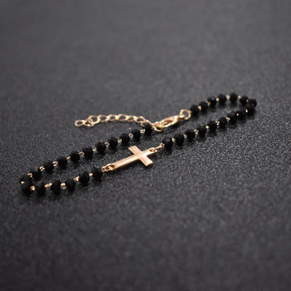 Gold Rosary Sideways Cross Bracelet with Black Beads