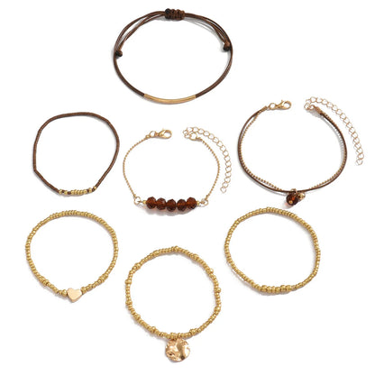 7PCS Boho Heart Beaded Bracelet Set for Women | Gold Tone Layered Stretch Bracelets with Heart Charm | Stackable Bohemian Jewelry Gift for Her