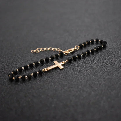 Gold Rosary Sideways Cross Bracelet with Black Beads