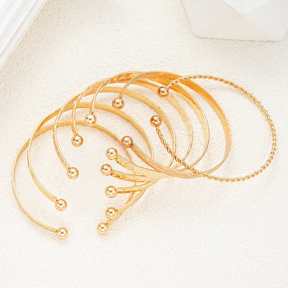7-Piece Punk Gold Bracelet Set for Women